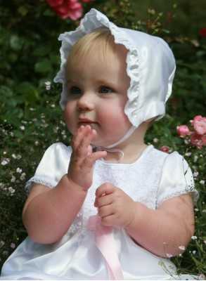 Christening gown from Grace of Sweden and bonnet for girl